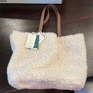 NWT reversible shearling and tan faux leather tote bag with attached coin purse